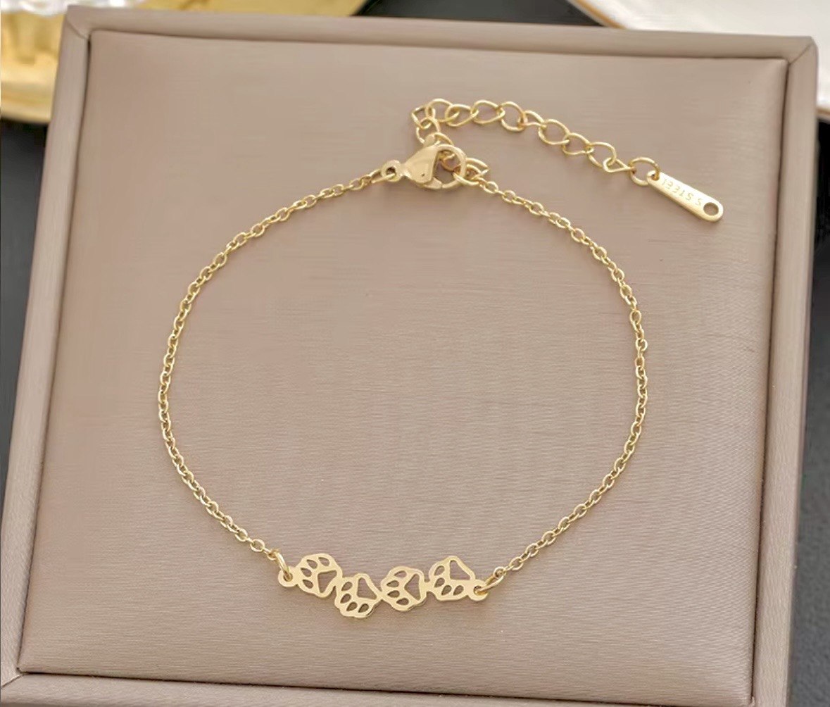 Collezione Aura – Bracciali in acciaio inox placcati oro 18K