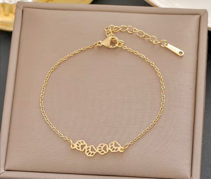 Collezione Aura – Bracciali in acciaio inox placcati oro 18K